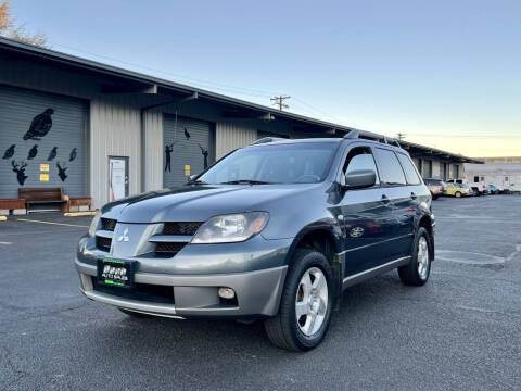 2003 Mitsubishi Outlander for sale at DASH AUTO SALES LLC in Salem OR