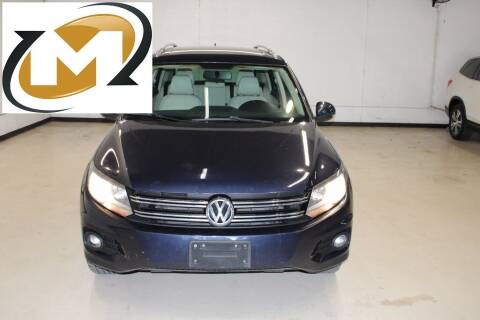 2015 Volkswagen Tiguan for sale at Midway Auto Group in Addison TX