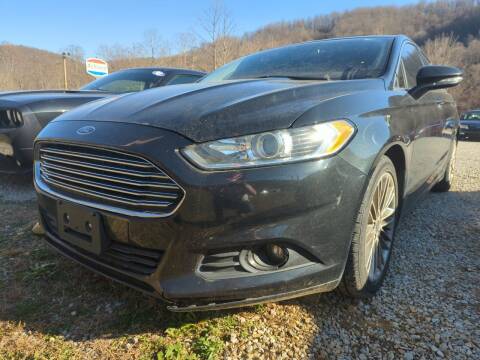 2015 Ford Fusion for sale at LEE'S USED CARS INC Morehead in Morehead KY
