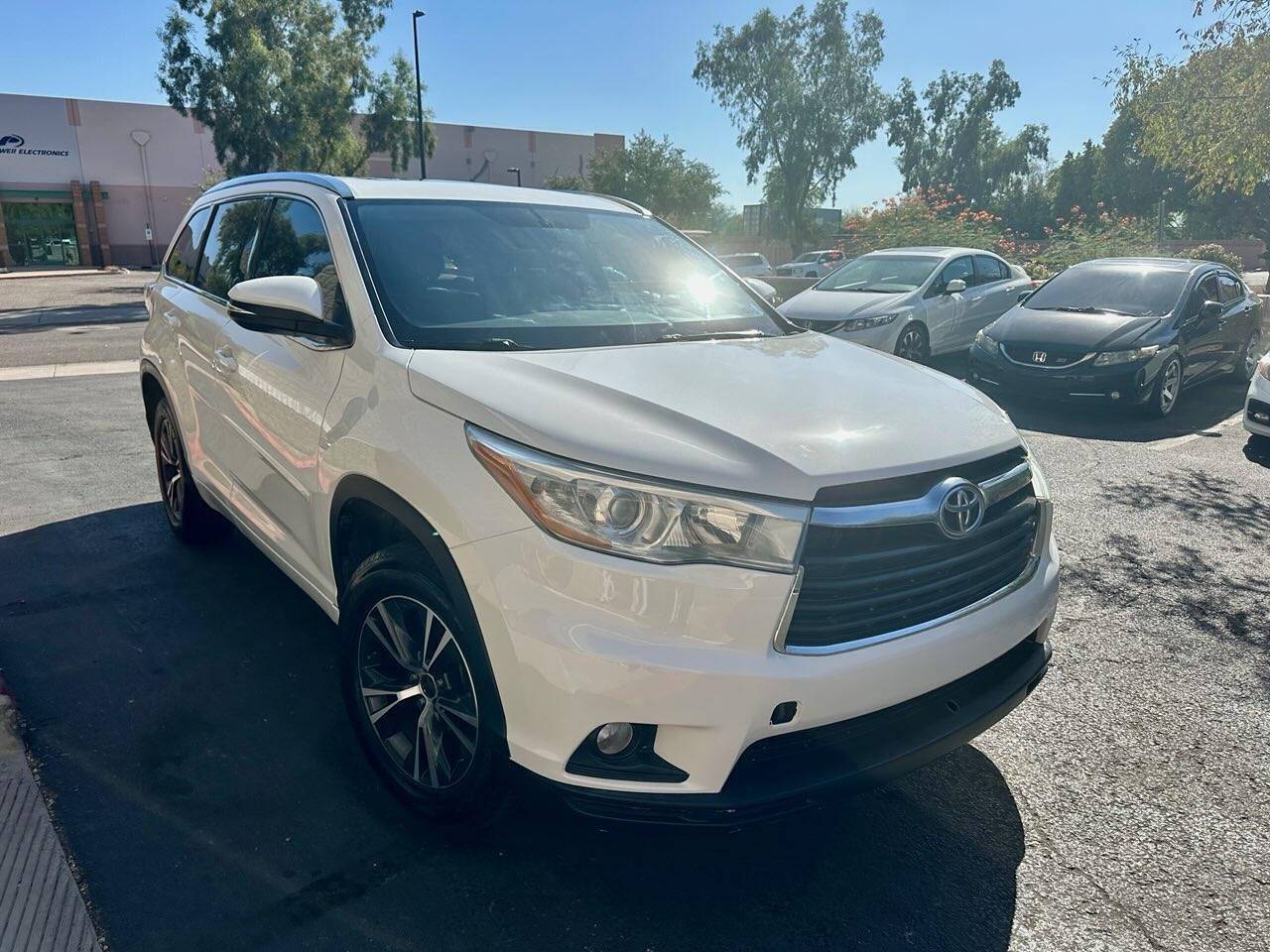 2016 Toyota Highlander for sale at HUDSONS AUTOS in Gilbert, AZ