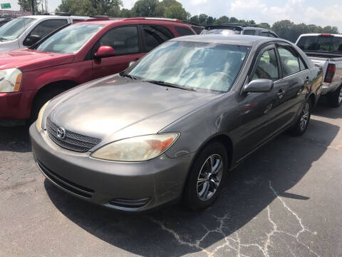 2003 Toyota Camry for sale at Sartins Auto Sales in Dyersburg TN