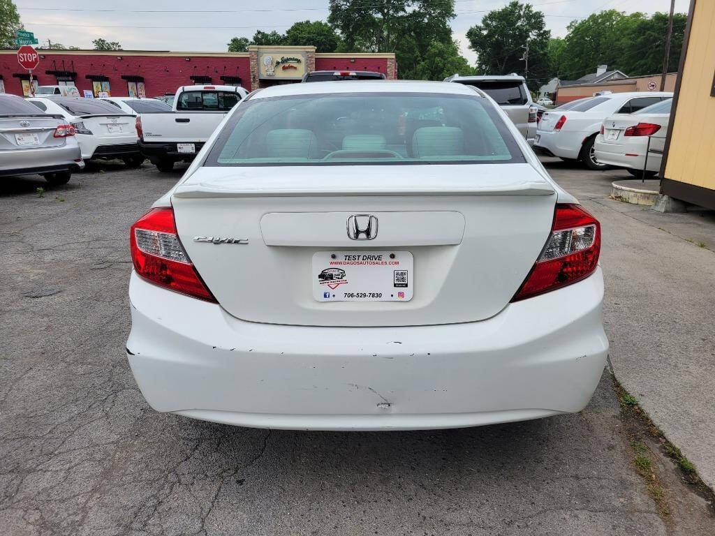 2012 Honda Civic for sale at DAGO'S AUTO SALES LLC in Dalton, GA