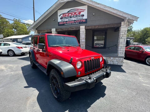 2015 Jeep Wrangler Unlimited for sale at SDM Auto Sales in Temple TX