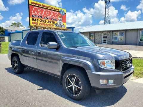 2014 Honda Ridgeline for sale at Mox Motors in Port Charlotte FL