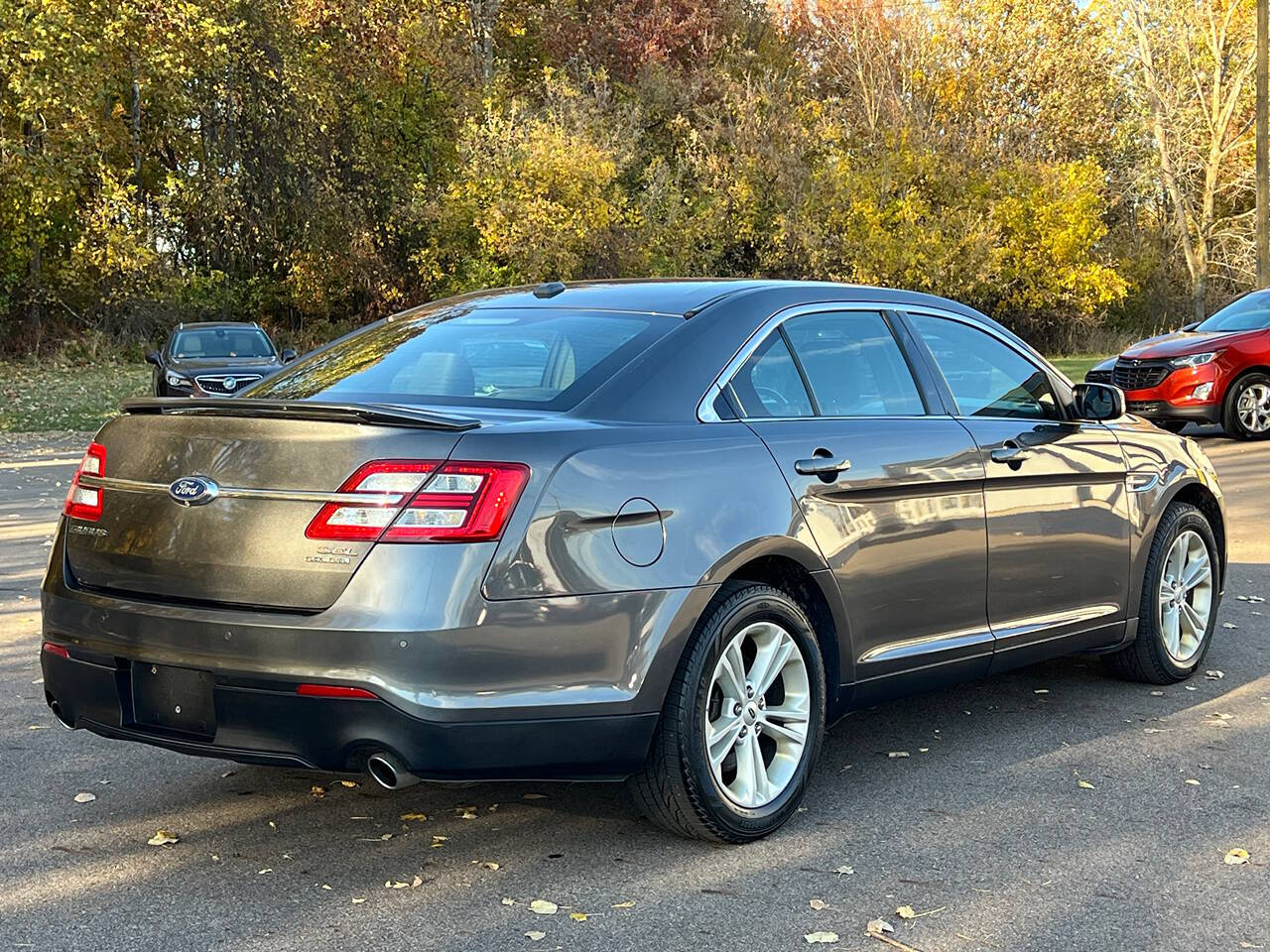 2015 Ford Taurus for sale at Spartan Elite Auto Group LLC in Lansing, MI