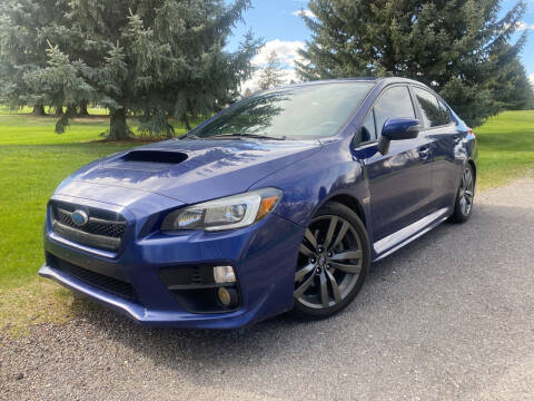 2016 Subaru WRX for sale at BELOW BOOK AUTO SALES in Idaho Falls ID