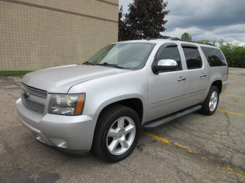 2010 Chevrolet Suburban for sale at Caruzin Motors in Flint MI