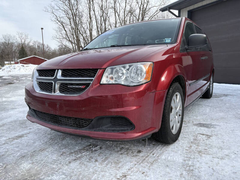 2015 Dodge Grand Caravan for sale at CHAMPION CAR CENTER in Canastota NY