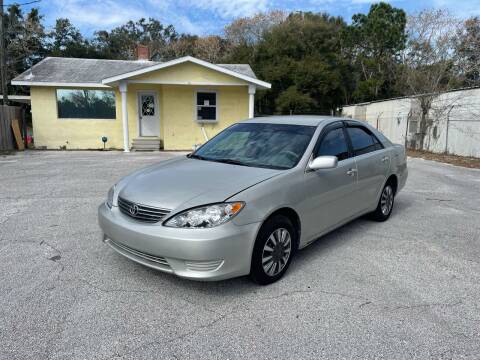 2006 Toyota Camry for sale at Louie's Auto Sales in Leesburg FL
