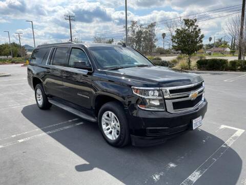 2016 Chevrolet Suburban for sale at E and M Auto Sales in Bloomington CA