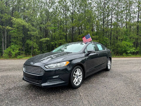 2014 Ford Fusion for sale at Drive 1 Auto Sales in Wake Forest NC