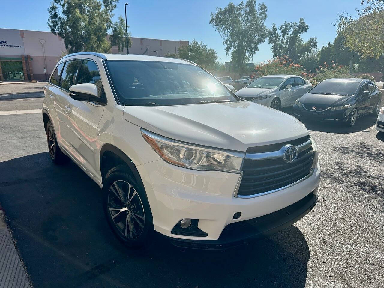 2016 Toyota Highlander for sale at HUDSONS AUTOS in Gilbert, AZ