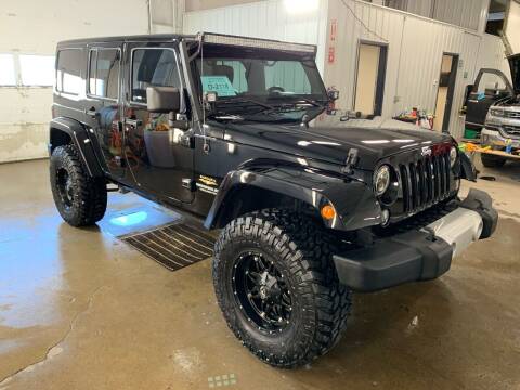 2014 Jeep Wrangler Unlimited for sale at Premier Auto in Sioux Falls SD