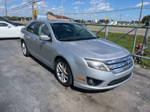 2012 Ford Fusion for sale at HEDGES USED CARS in Carleton MI