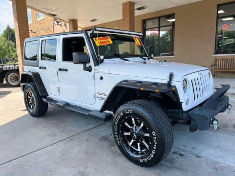 2014 Jeep Wrangler Unlimited for sale at Arandas Auto Sales in Milwaukee WI