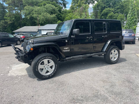 2011 Jeep Wrangler Unlimited for sale at Adairsville Auto Mart in Plainville GA