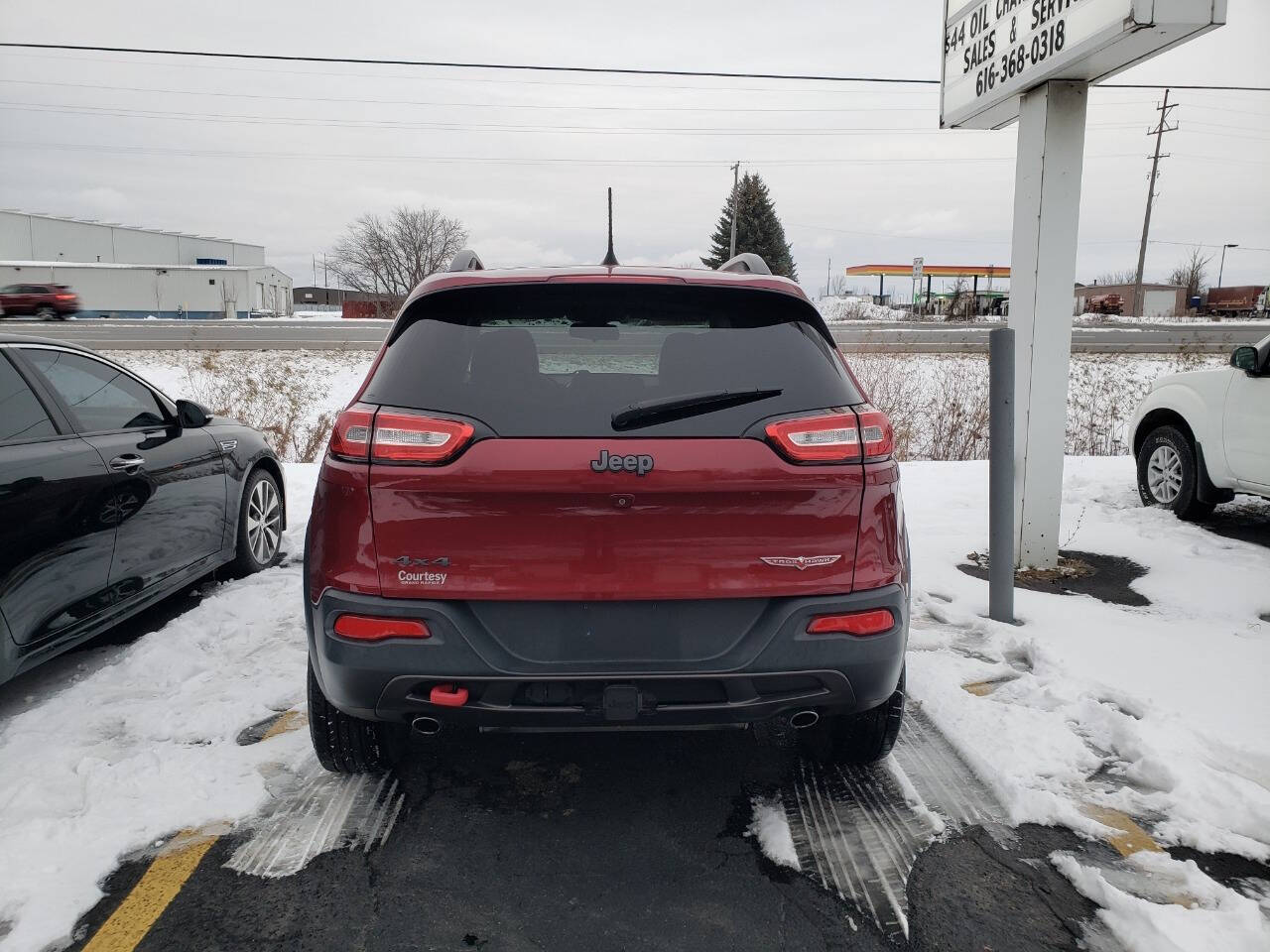 2016 Jeep Cherokee for sale at Platinum Motors in Holland, MI