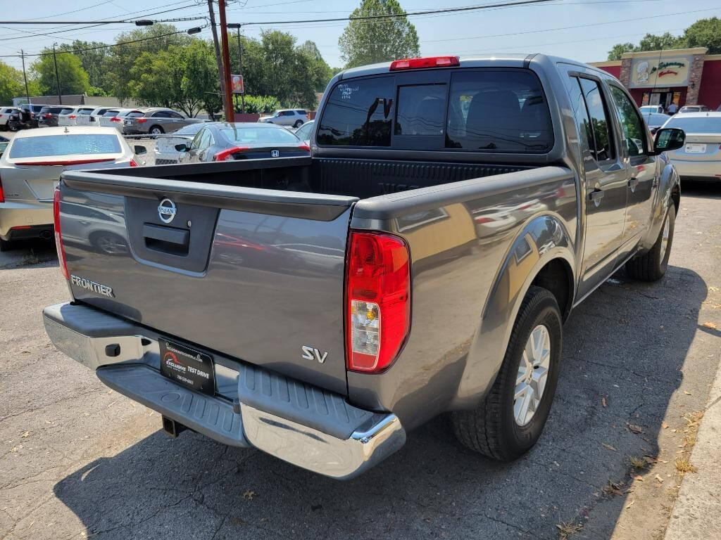 2016 Nissan Frontier for sale at DAGO'S AUTO SALES LLC in Dalton, GA