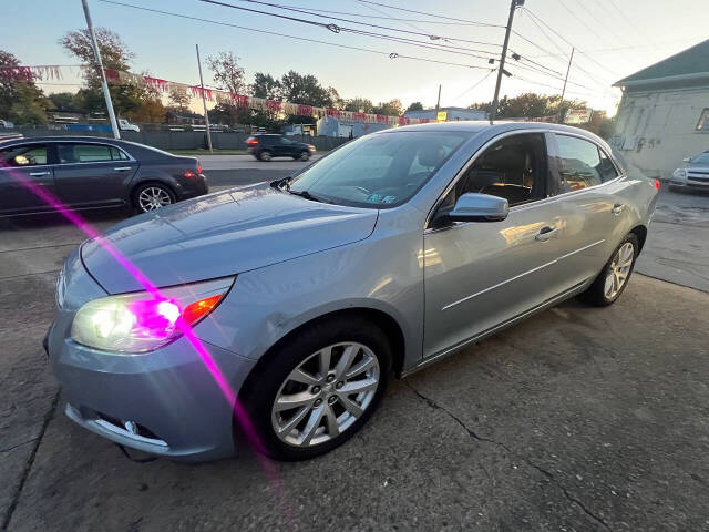 2013 Chevrolet Malibu for sale at RT Barrett Auto Group in Austintown, OH