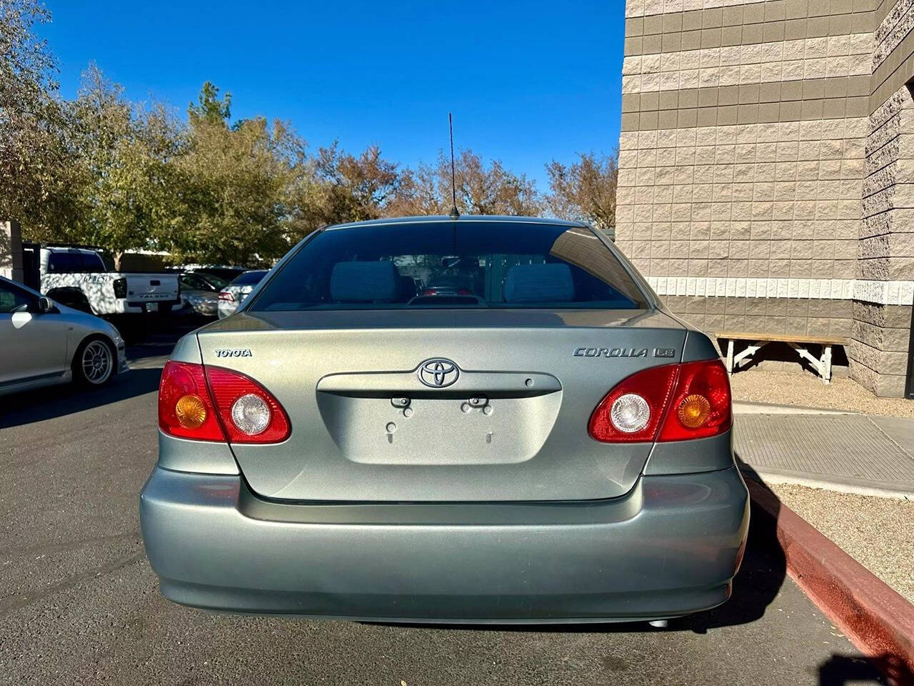 2003 Toyota Corolla for sale at HUDSONS AUTOS in Gilbert, AZ