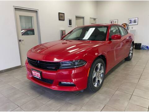 2015 Dodge Charger for sale at DAN PORTER MOTORS in Dickinson ND