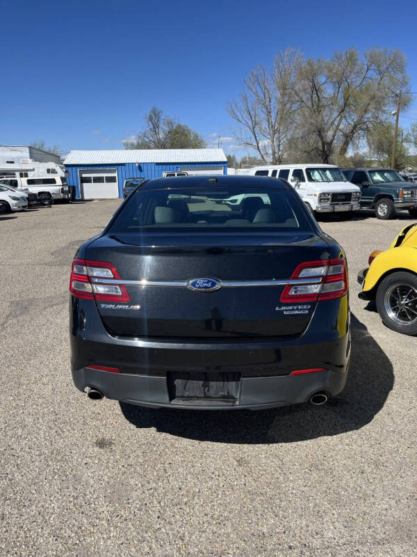 2014 Ford Taurus for sale at AFFORDABLY PRICED CARS LLC in Mountain Home ID