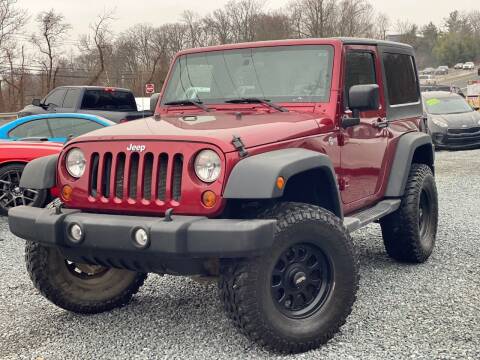 2011 Jeep Wrangler for sale at A&M Auto Sales in Edgewood MD