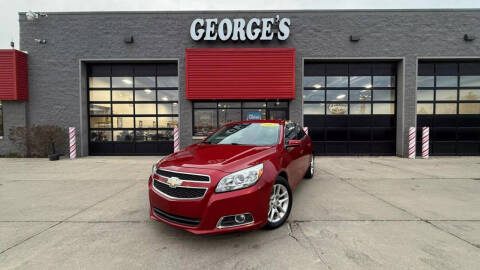 2013 Chevrolet Malibu for sale at George's Used Cars in Brownstown MI