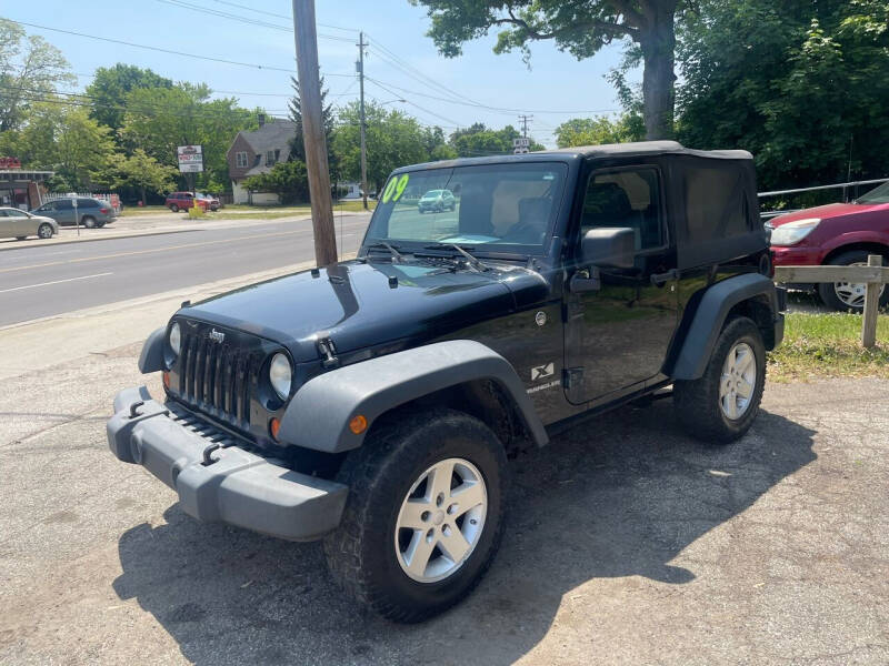 2009 Jeep Wrangler for sale at RIDGEWAY INC in Ashtabula OH