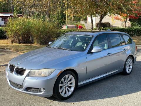 2011 BMW 3 Series for sale at Triangle Motors Inc in Raleigh NC