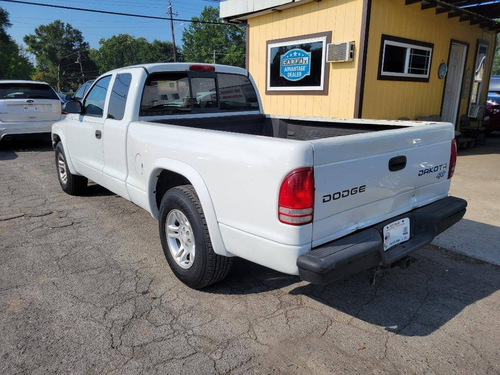 2004 Dodge Dakota for sale at DAGO'S AUTO SALES LLC in Dalton, GA