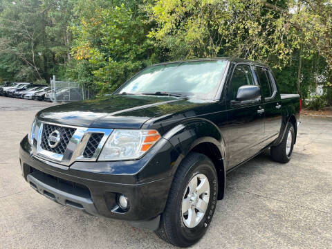 2012 Nissan Frontier for sale at Legacy Motor Sales in Norcross GA