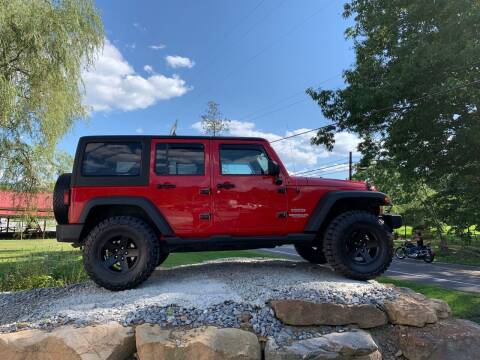 2012 Jeep Wrangler Unlimited for sale at NORTH 36 AUTO SALES LLC in Brookville PA