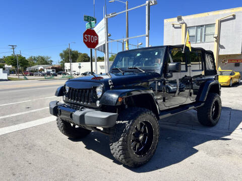 2014 Jeep Wrangler Unlimited for sale at Global Auto Sales USA in Miami FL