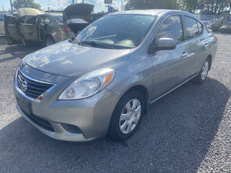 2014 Nissan Versa for sale at Lamar Auto Sales in North Charleston SC