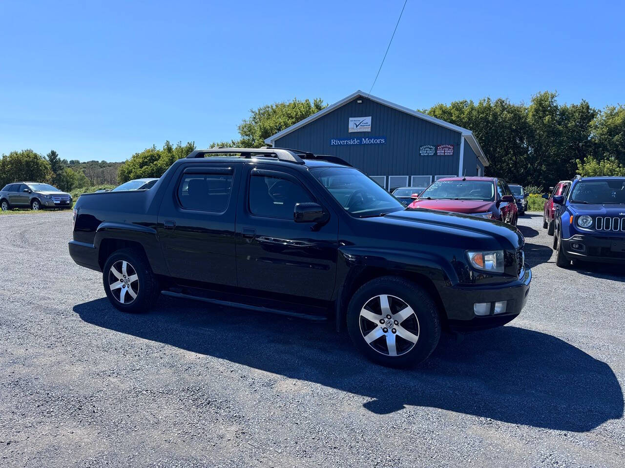 2014 Honda Ridgeline for sale at Riverside Motors in Glenfield, NY