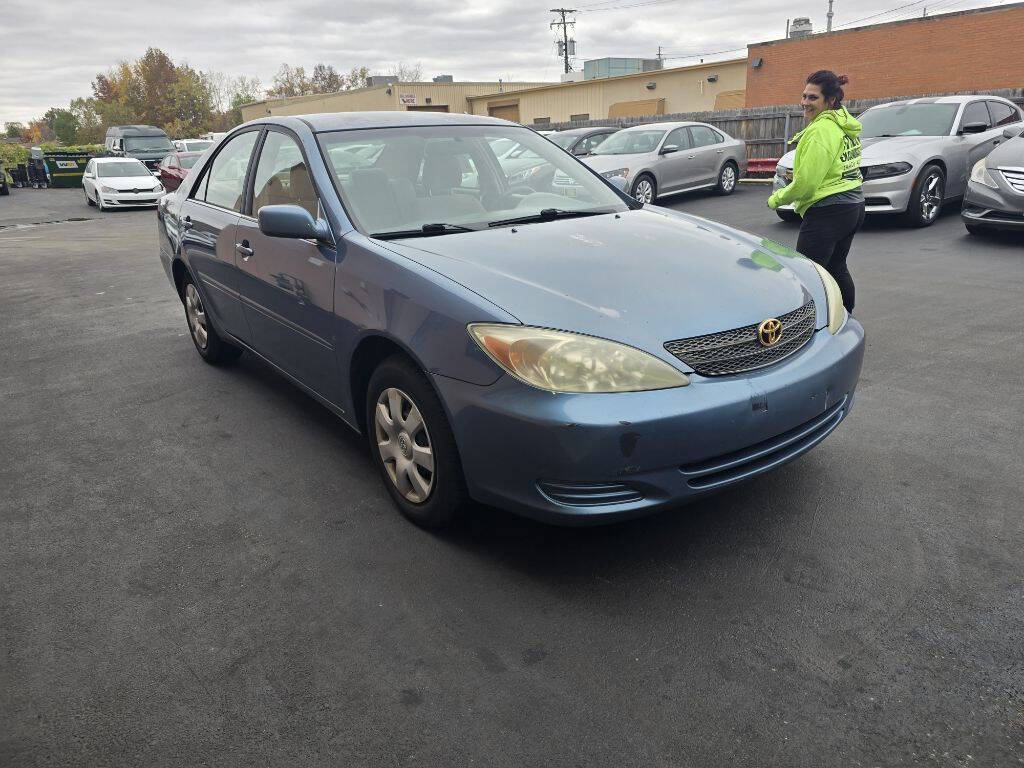 2003 Toyota Camry for sale at ENZO AUTO in Parma, OH