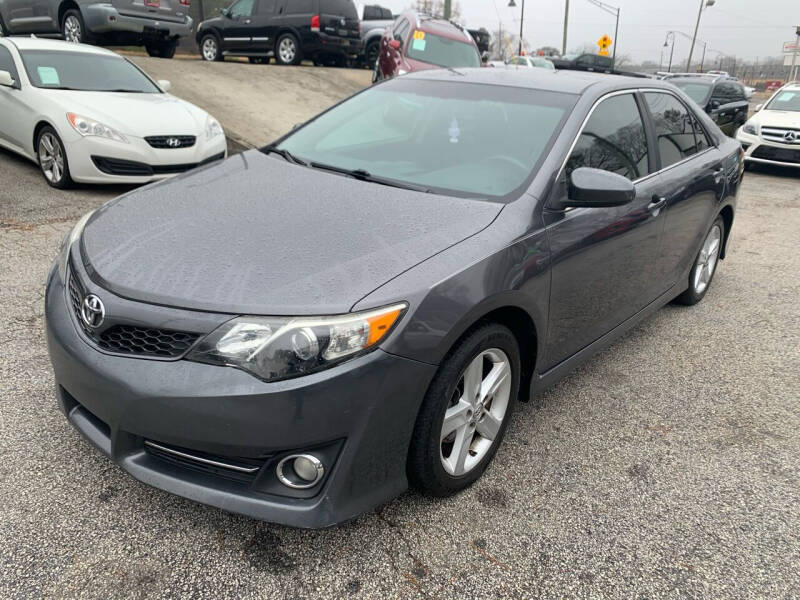 2014 Toyota Camry for sale at Philip Motors Inc in Snellville GA