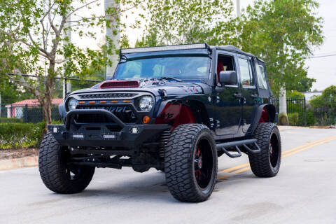 2013 Jeep Wrangler for sale at AUTO BURGOS in Hollywood FL