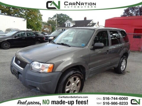 2003 Ford Escape for sale at CarNation AUTOBUYERS Inc. in Rockville Centre NY