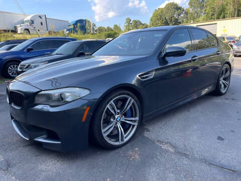 2013 BMW M5 for sale at GEORGIA AUTO DEALER LLC in Buford GA
