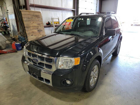 2009 Ford Escape for sale at Hometown Automotive Service & Sales in Holliston MA