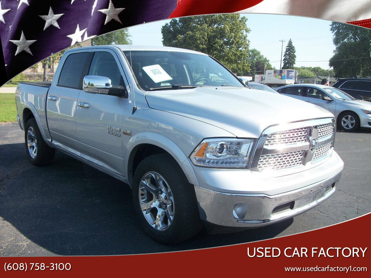 2015 RAM 1500 Laramie 4x4 4dr Crew Cab 5.5 ft. SB Pickup's photo