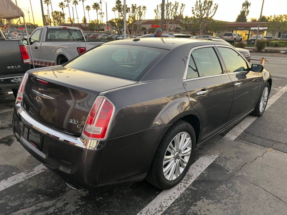 2014 Chrysler 300 for sale at Unique Auto Sales, Inc. in Bell, CA