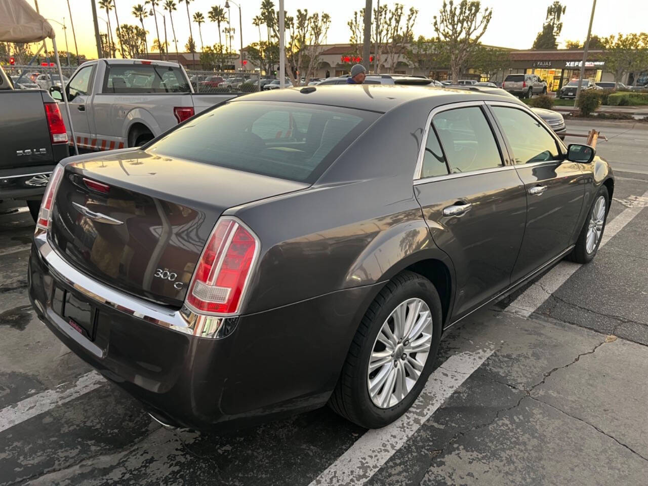 2014 Chrysler 300 for sale at Unique Auto Sales, Inc. in Bell, CA