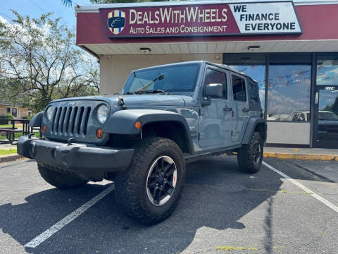 2014 Jeep Wrangler Unlimited for sale at Dealswithwheels in Hastings MN