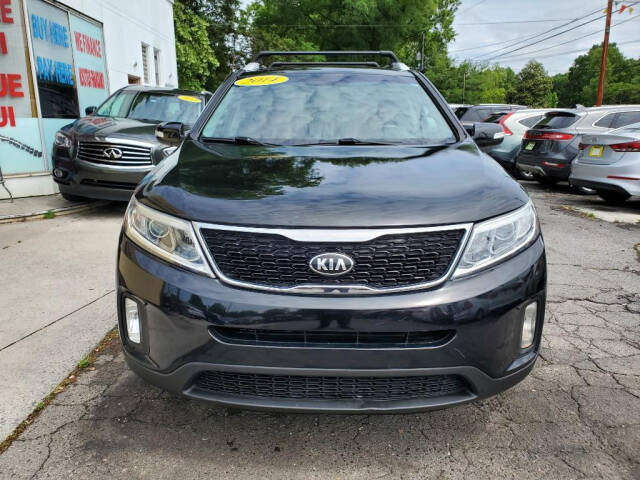 2014 Kia Sorento for sale at DAGO'S AUTO SALES LLC in Dalton, GA