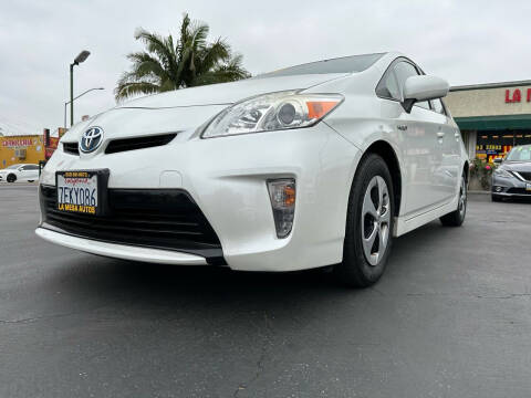 2014 Toyota Prius for sale at La Mesa Auto Sales in Huntington Park CA