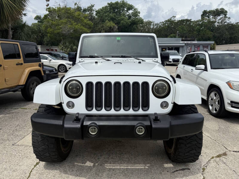 Used 2014 Jeep Wrangler Unlimited Sahara with VIN 1C4BJWEG2EL254054 for sale in Daytona Beach, FL