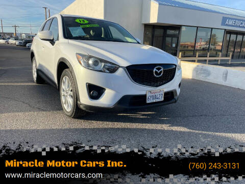 2013 Mazda CX-5 for sale at Miracle Motor Cars Inc. in Victorville CA